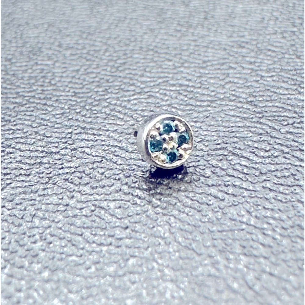 BVLA 3mm micro pave disc threadless, in 14k white gold with ocean blue diamonds.